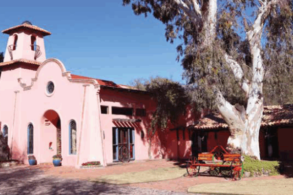Historic Spanish-style Hacienda at Rancho de Los Cerros, surrounded by Catalina State Park in Tucson, Arizona.